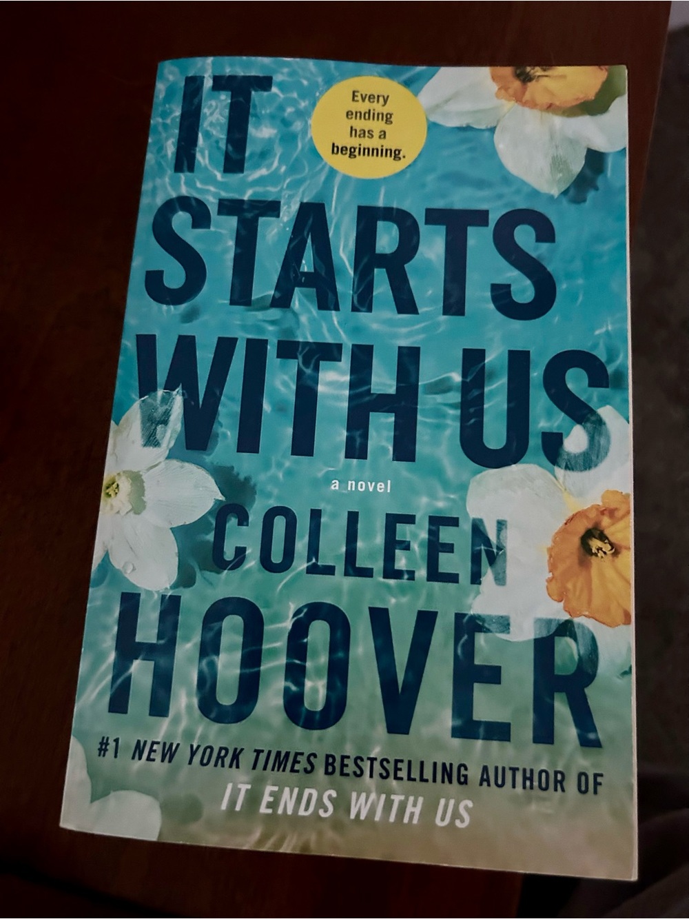 It Starts With Us by Colleen Hoover — Teal Floral Paperback